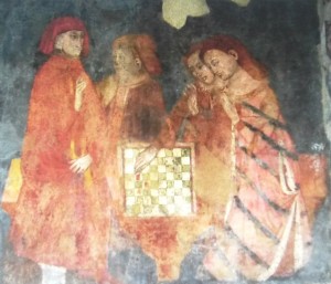 Figura 1 - Dama che vince a scacchi, affresco del castello dell'Arco (Trento)